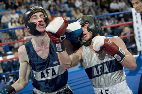 what is the metal thing used in boxing|what do they put on boxers face.